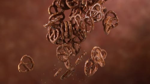 Pretzels suspended in the air in elegant slow motion shot on phantom flex 4k