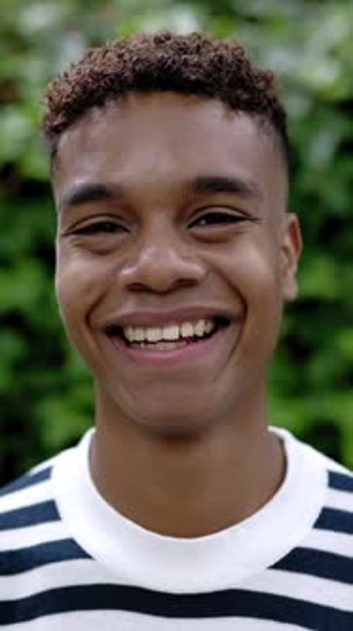 Young Man Smiling Portrait Close Up