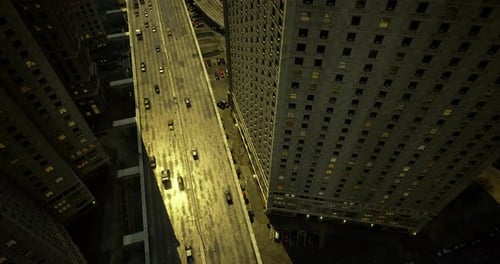 City Skyline View with Traffic and Towering Buildings During Sunset