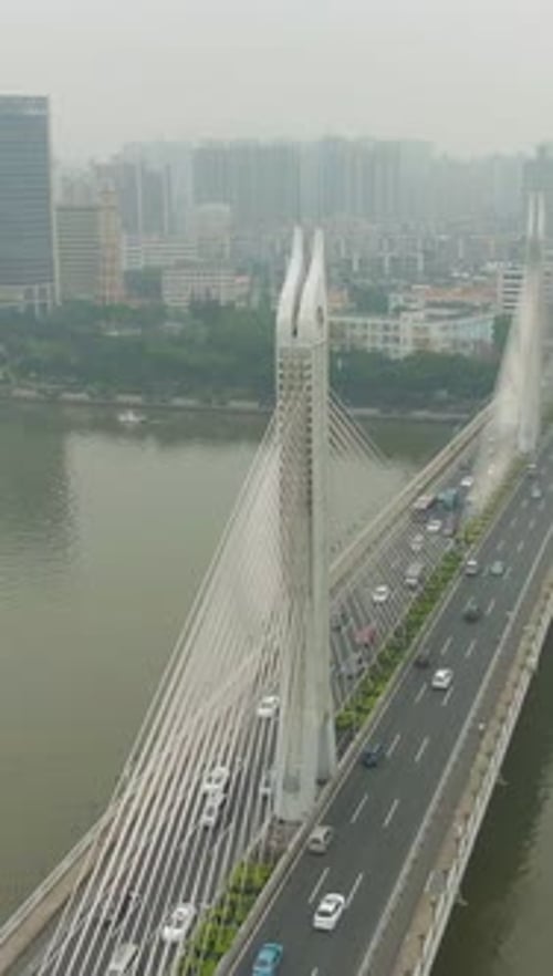 Bridge in Guangzhou Car Traffic and Cityscape Guangdong China Aerial View Vertical Video