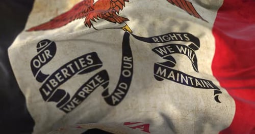 Waving Grunge Patriotic Flag with Eagle and Slogan