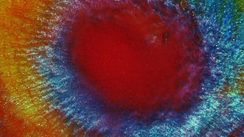 Divergent Drop on a Multicolored Background of Red Blue Yellow Green Colors and Shades