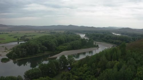 A River Among Forests And Mountains