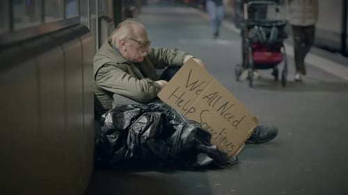 Elderly Homeless Man Suffering From Poverty Looking for Help at Train Station