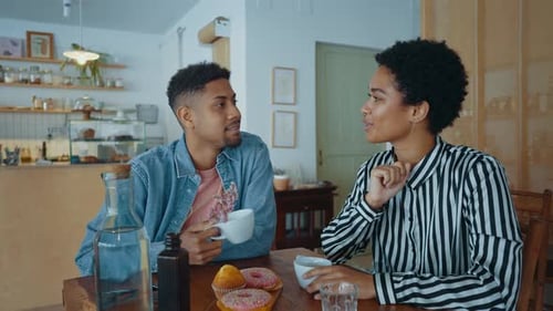 Cinematic image of a couple relaxing in a nordic styled cafe