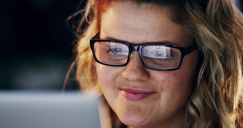 4k video footage of a happy young woman using a laptop