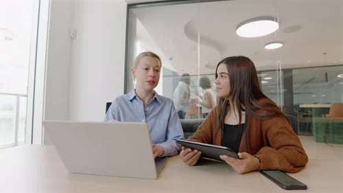 A Group of Diverse Professionals Collaborating Effectively in a Modern Office Setting