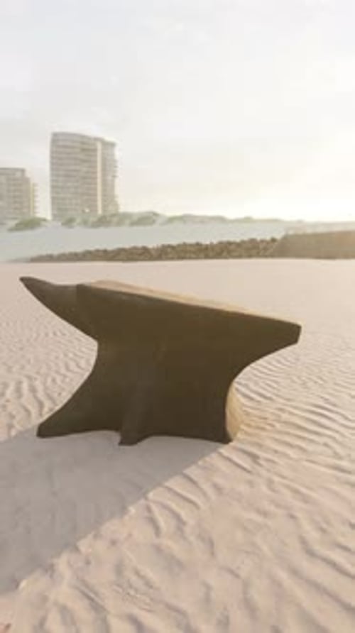 Old Anvil on a Sandy Beach