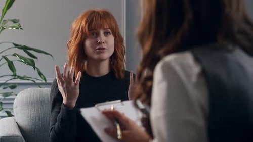 Woman Talking During Therapy Session Indoors