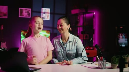 Woman and Child Recording Media Broadcast