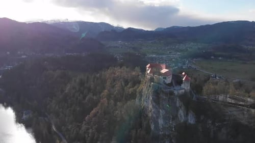 Lake Bled with castle, Slovenia, Europe. Castle on top of the huge rock. Aerial panoramic view of be