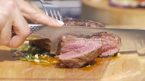 Cutting steak outside to eat