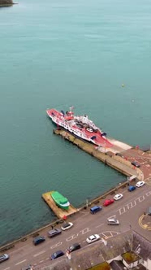 Reversing and rising social ratio vertical video of the Strangford Ferry in Portaferry, County Down