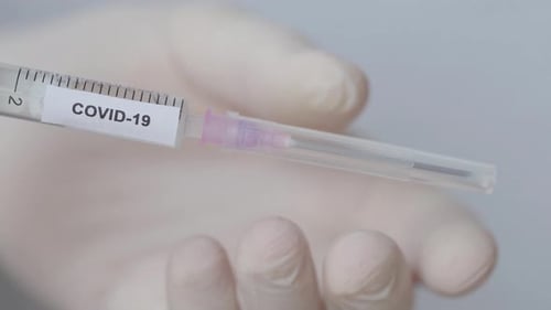 Nurse With Glove Pull Out The Needle From Syringe For Covid19 Vaccine, Close Up Shot