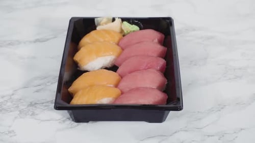 Sushi Food Close Up in Tray with Chopsticks