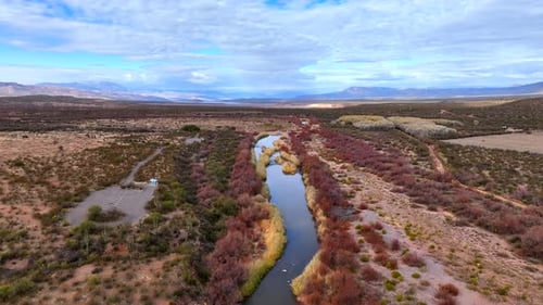 Aerial view of Salt River and rugged landscape, United States.