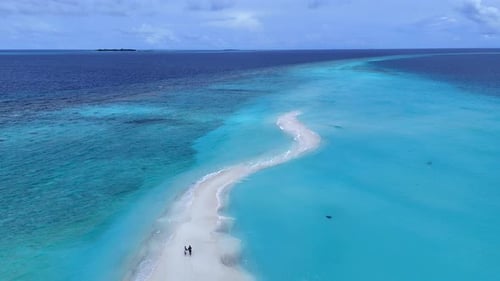A couple in love walking on an island in the Maldives