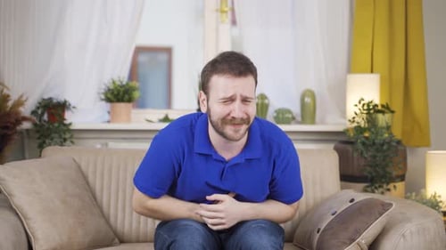 Man with stomachache.