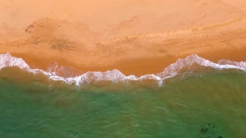 The Beach Displays a Serene Landscape with Golden Sands Calming Waves Italy