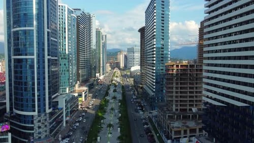 Modern City Street View with Towering Buildings