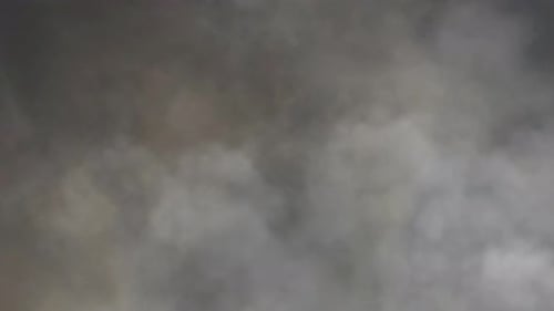 Storm Clouds Lightning in dark sky background.