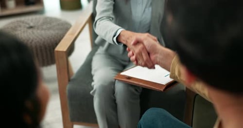 Meeting, couple and agent with handshake for real estate deal, property investment or agreement