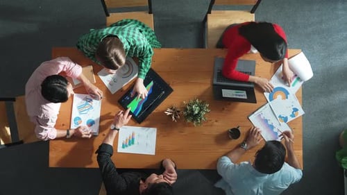 Top view of smart business team looking chart while plan strategy. Convocation.