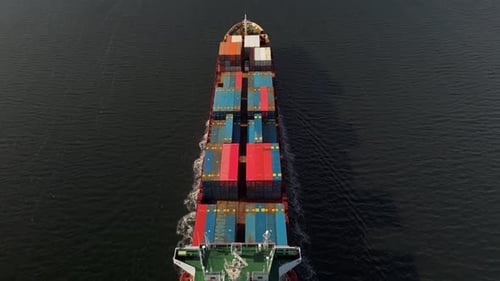 Stern Of Container Ship Entering Halifax Sea Freight Shipping And Global Trade