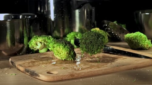 Broccoli Falls on the Board Filmed is Slow Motion 1000 Fps