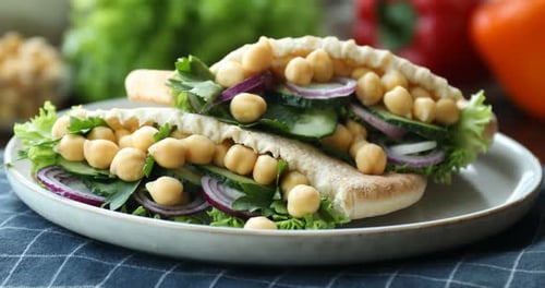 Close-up of Hummus Pita Pockets with Fresh Vegetables
