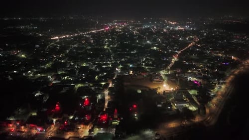 City night view of ram paidi ghats in Ayodhya drone video