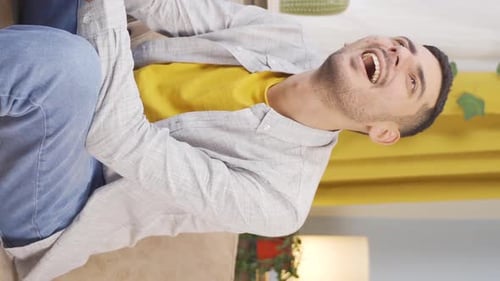 Vertical video of The man who smells good is happy.