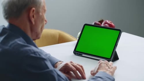 Elderly Man And Tablet With Green Screen Concept Of Video Call And Online Communication Chroma Key