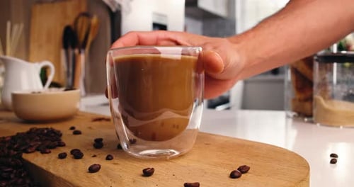 Coffee Drink In Modern Glass Cup on Kitchen Counter
