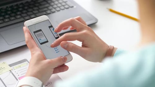 Technology And People Concept - Creative Woman With Smartphone And Laptop Computer Working On Int...