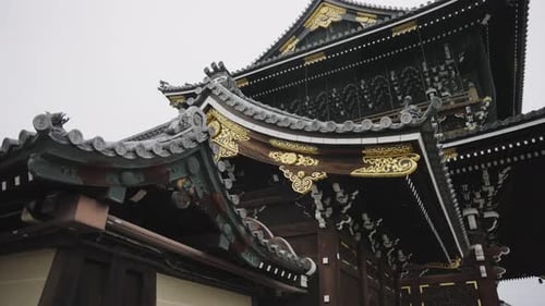 Higashi Honganji Temple, Kyoto Japan. Pan over Golden Details of Temple Roof