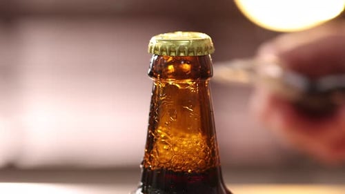 Opening Amber Bottle of Beer
