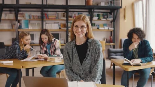 Students Study Together in Bright Library