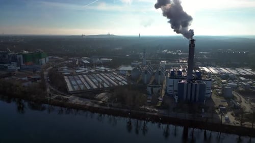 Waste energy plant factory with smoke chimney. Amazing aerial view flight drone