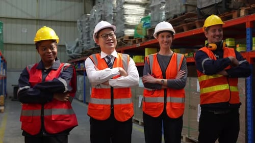 Warehouse Industrial and Logistics Companies. Dispatcher in uniform making inventory in storehouse.