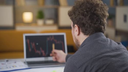 Cryptocurrency analysis, thoughtful man.