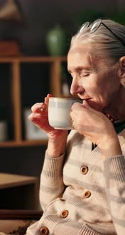 Smell, coffee or senior woman thinking in home for peace, warm beverage or retirement in lounge