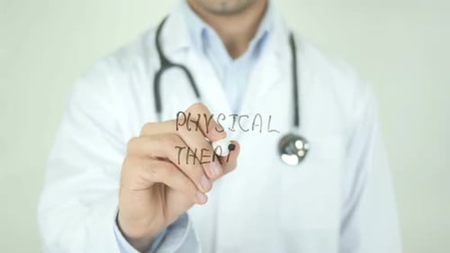 Doctor Writes Physical Therapy on Clear Screen
