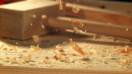 Wooden Shavings Falling on the Carpenter's Table Filmed on a Highspeed Camera at 1000 Fps