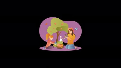 Filles décorant des œufs de Pâques avec un lapin dans un parc