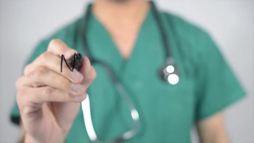 Doctor Writes Neurologist on Clear Surface