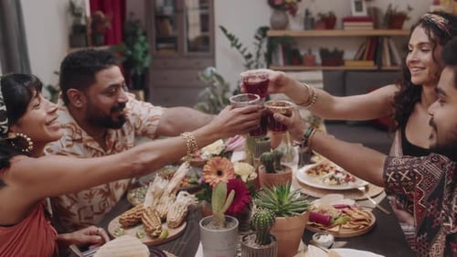 Young Adults Toasting at Friendly Gathering