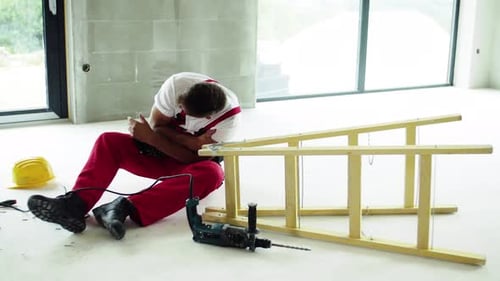 Construction worker injured on the jobsite, ladder