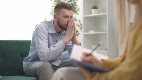 Man Attends Therapy Session, Seeks Mental Health