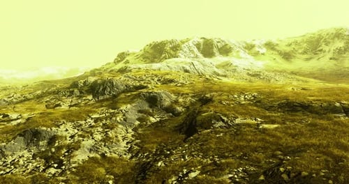 Mountain Landscape Under a Yellow Sky During Serene Daylight Hours
